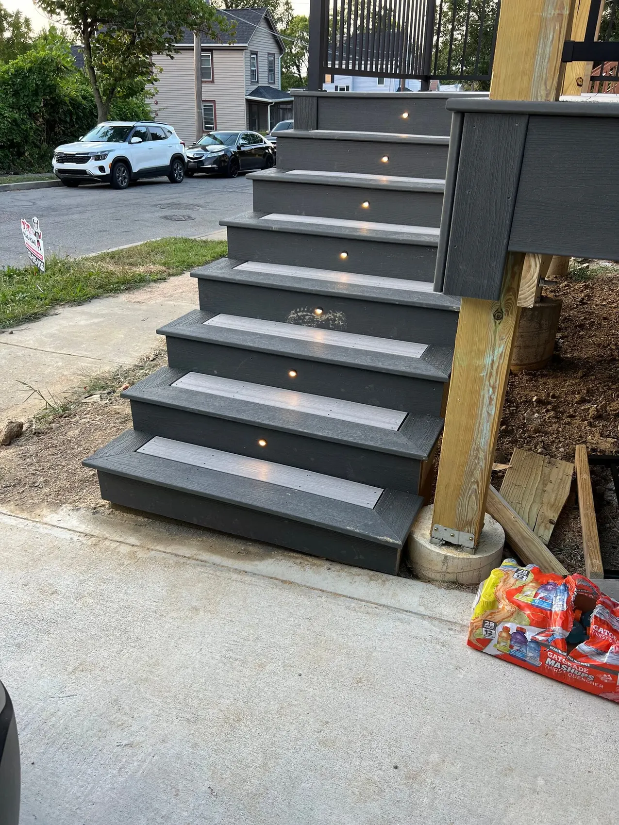 Dark composite stairs with lights set into each riser
