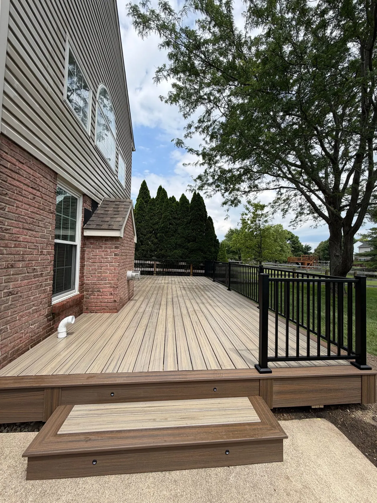 Finished composite deck by Prime Home Improvements